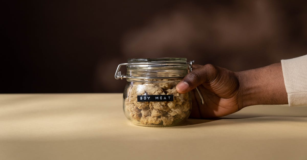Best meat replacements for a vegetarian/vegan? - Close-Up Shot of a Person Holding a Jar of Soy Meat Best meat replacements for a vegetarian/vegan? - Close-Up Shot of a Person Holding a Jar of Soy Meat