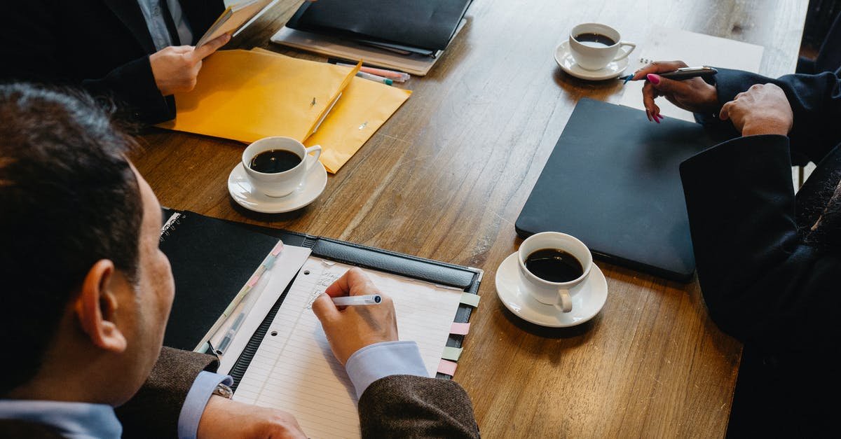 Best Office Coffee Solution [closed] - Crop colleagues working together in office
