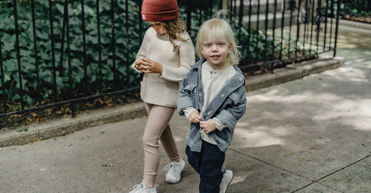 Best Way To Remove Fajita Contents From Marinade - Cheerful siblings walking on sidewalk Best Way To Remove Fajita Contents From Marinade - Cheerful siblings walking on sidewalk
