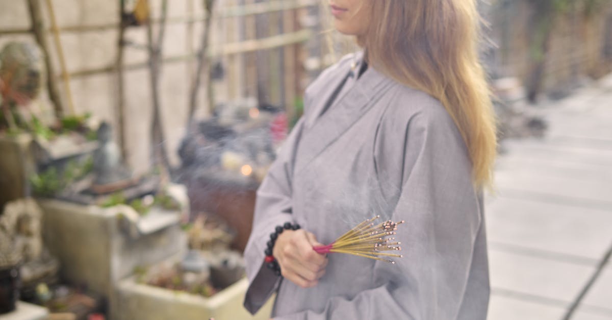 Biscuit burning around sides [closed] - Woman in Gray Coat Holding Brown Stick
