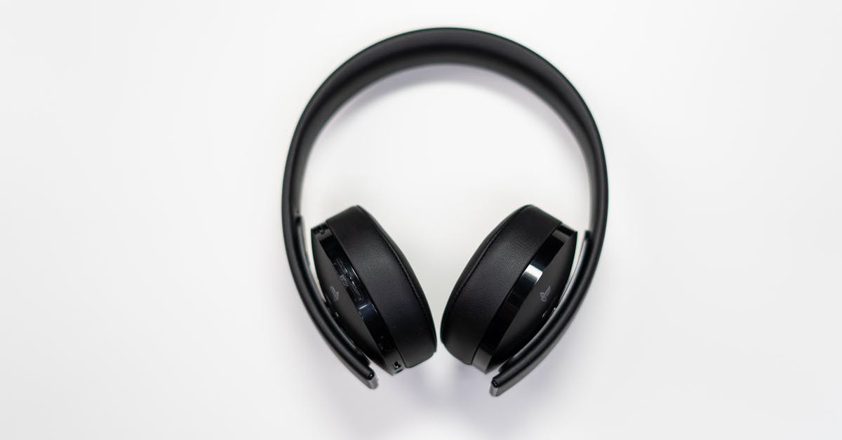 Black apple crumble! - Black Wireless Headphones on White Surface Black apple crumble! - Black Wireless Headphones on White Surface