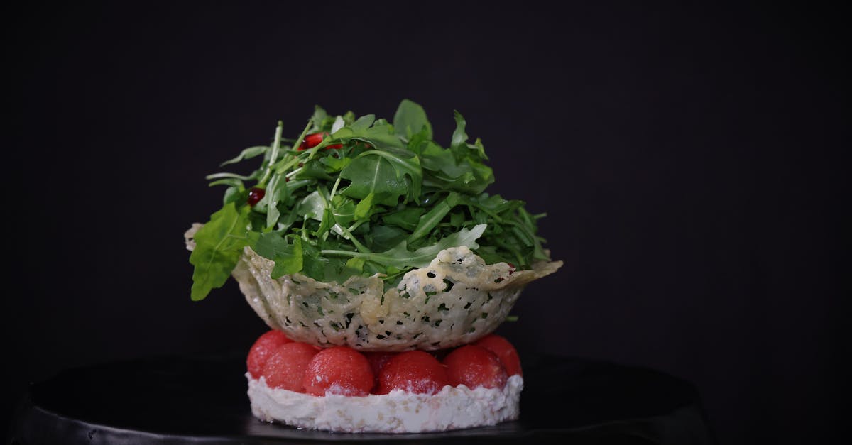 Black Mold On Cheese - Green Vegetable Salad on Top of Red Cherry Tomatoes Black Mold On Cheese - Green Vegetable Salad on Top of Red Cherry Tomatoes