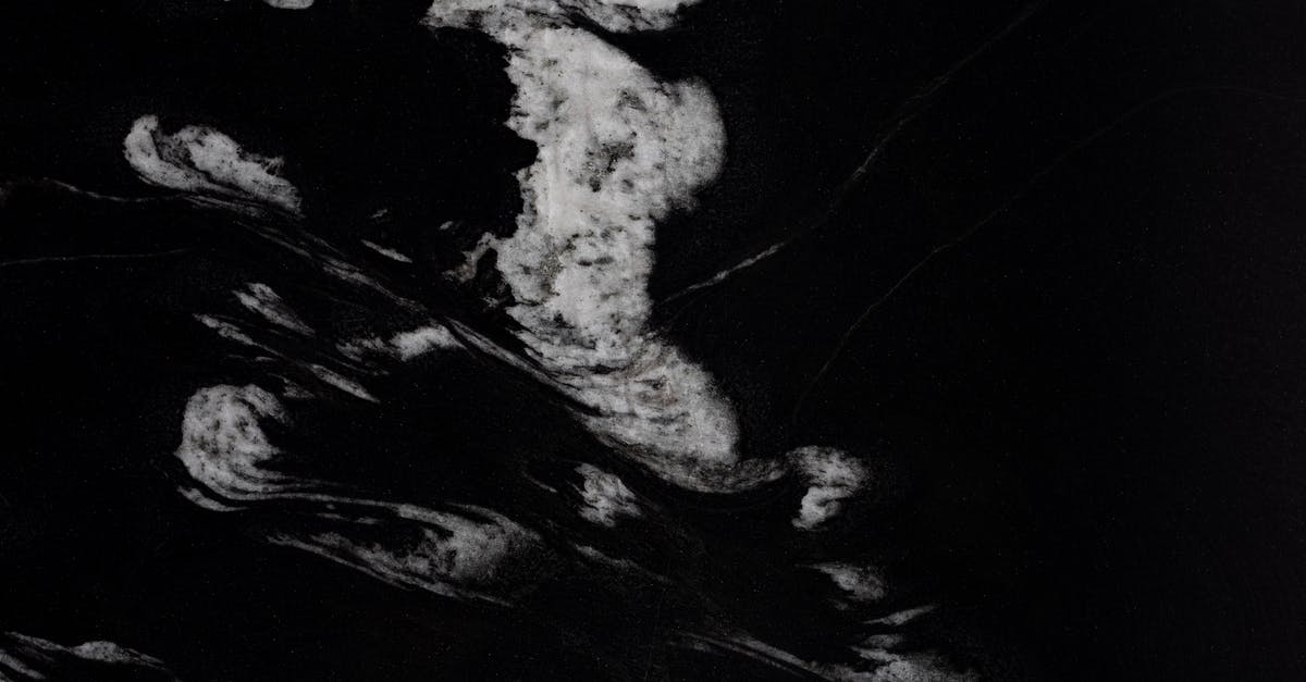 Black stains on aluminium+teflon griddle - White Stains on Black Surface Black stains on aluminium+teflon griddle - White Stains on Black Surface