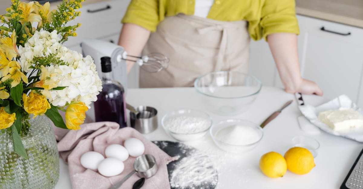 Blender vs food processor vs juicer - Crop woman with various ingredients