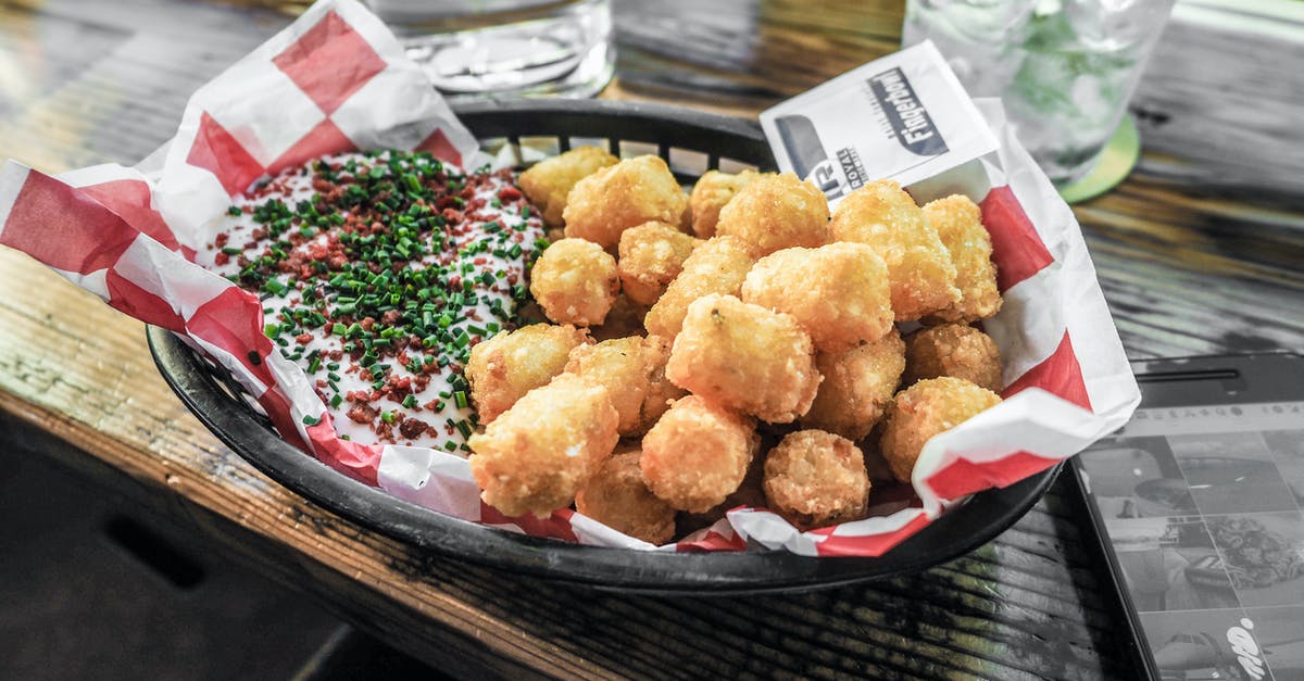 Bone-in fried chicken pieces not cooking through - Tray of Cooked Food Bone-in fried chicken pieces not cooking through - Tray of Cooked Food