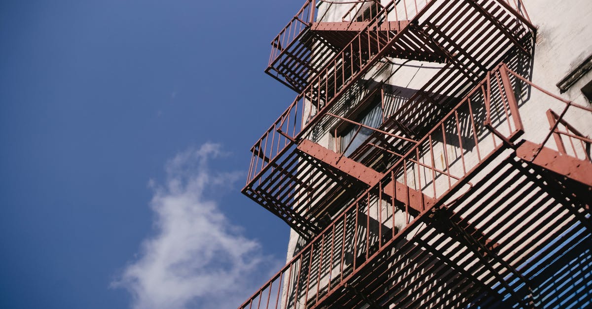Books for very high level vegan cooking? - Tall staircase with railings of concrete building