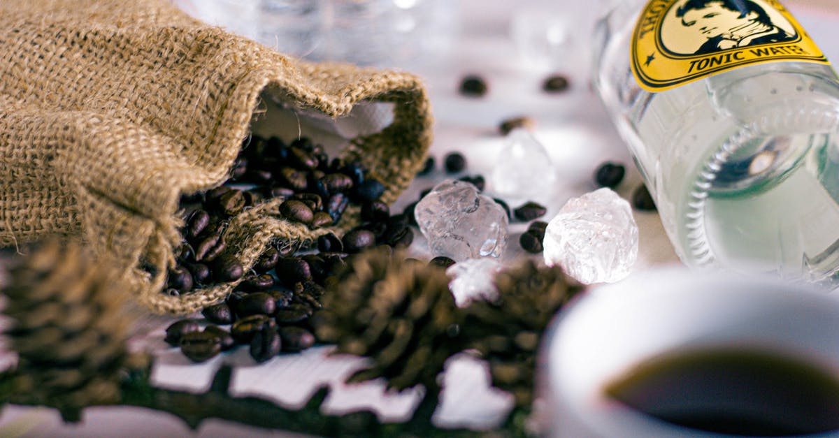 Bottling and Storing Cold-Brewed Coffee? - Selective Focus Photography of Bag of Beans Beside Clear Glass Bottle Bottling and Storing Cold-Brewed Coffee? - Selective Focus Photography of Bag of Beans Beside Clear Glass Bottle