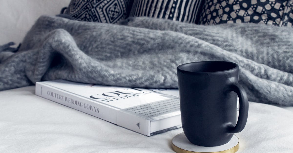 Bread crusty outside and super soft inside - Black Ceramic Mug on Round White and Beige Coaster on White Textile Beside Book