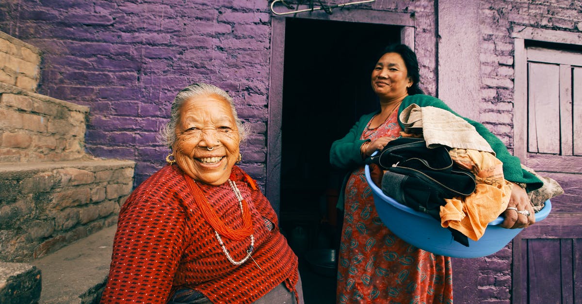 Brining before dehydrating? - Two Women Posing in Front of Slum Violet House Brining before dehydrating? - Two Women Posing in Front of Slum Violet House