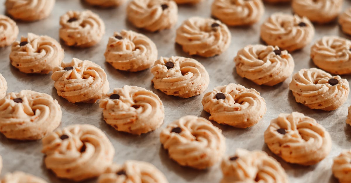 Butter and Butter Flavored Shortening - Brown Cookies on Baking Tray Butter and Butter Flavored Shortening - Brown Cookies on Baking Tray