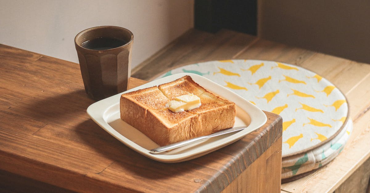 Butter in coffee - Butter on Toast and a Cup of Coffee Butter in coffee - Butter on Toast and a Cup of Coffee