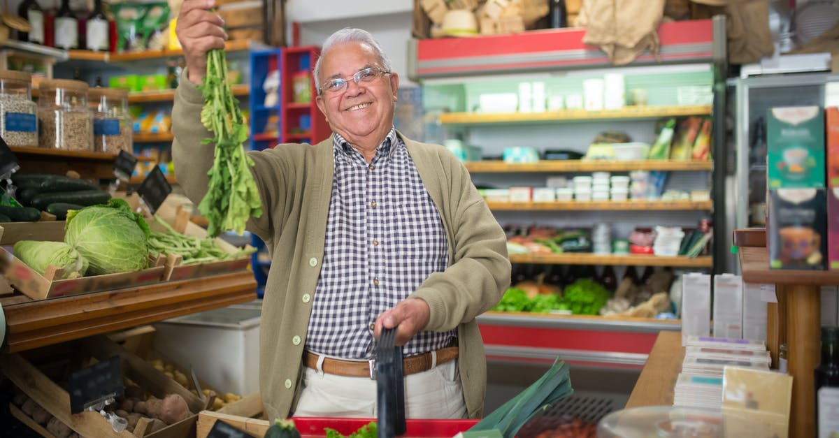 Buying whetstones - Elderly Man holding Vegetables Buying whetstones - Elderly Man holding Vegetables