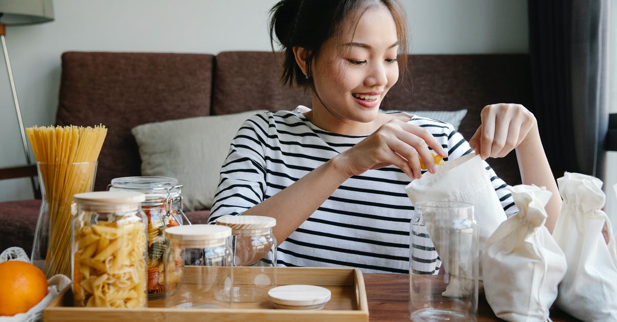 Can an open package of sausage lead to contamination of other foods? - Asian woman opening environmentally friendly bag of pasta Can an open package of sausage lead to contamination of other foods? - Asian woman opening environmentally friendly bag of pasta