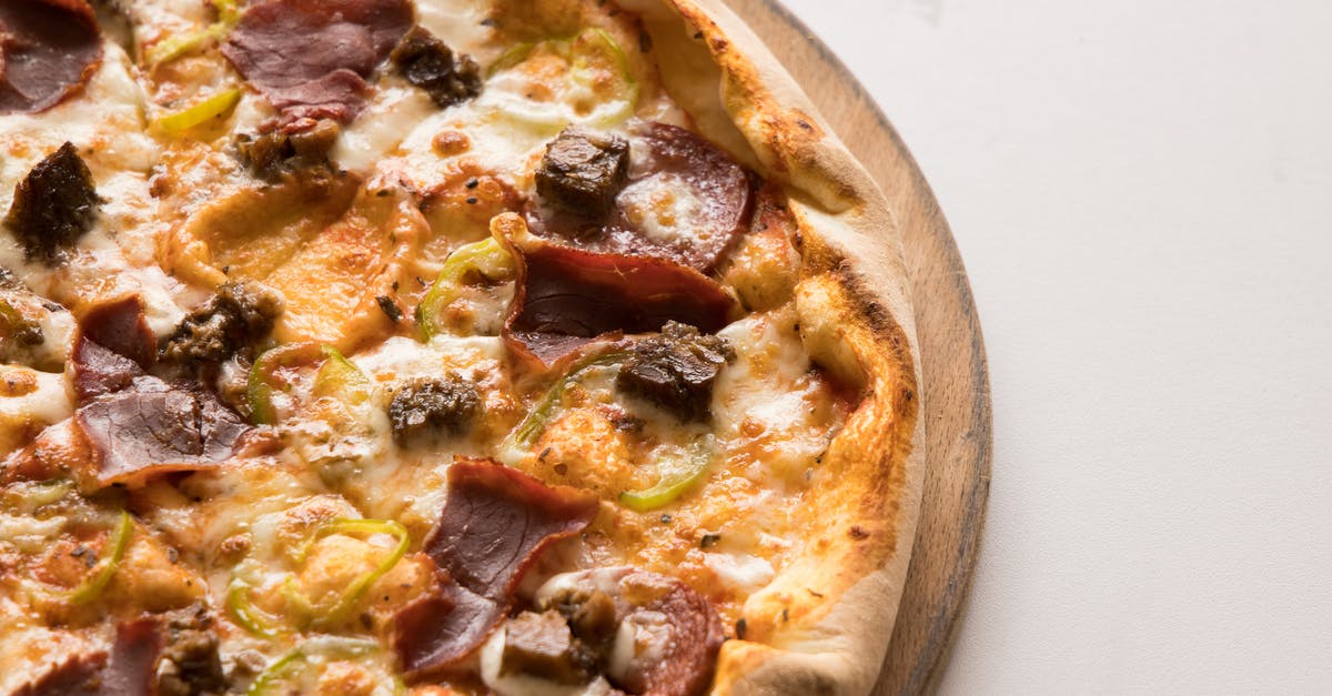Can baked savory pastries with ham or bacon be left at room temperature? [duplicate] - Pizza on Brown Wooden Tray