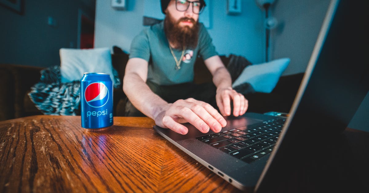 Can brownie dough sit? - Man in Blue Polo Shirt Using Black Laptop Computer