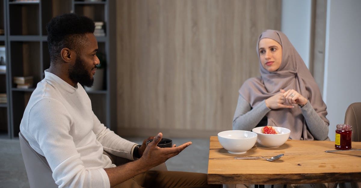 Can frozen peaches be made into jam or other things? - Positive young multiracial couple sitting at table and looking at each other while having breakfast together Can frozen peaches be made into jam or other things? - Positive young multiracial couple sitting at table and looking at each other while having breakfast together