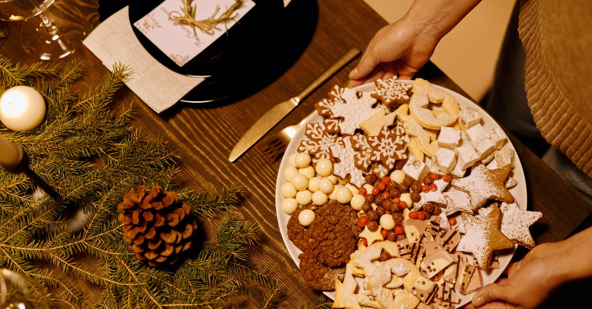 can i bake pine nuts? - Person Serving a Platter of Homemade Biscuits can i bake pine nuts? - Person Serving a Platter of Homemade Biscuits