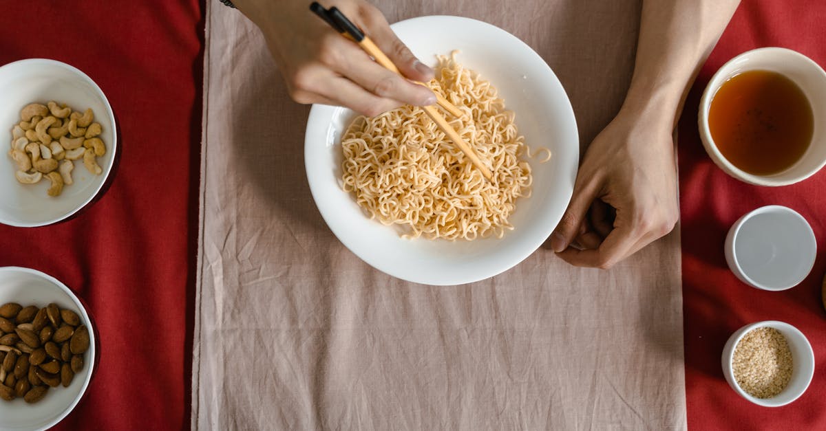 Can I change a recipe sequencing (parallelising consecutive steps)? - Person Holding White Ceramic Bowl With Pasta