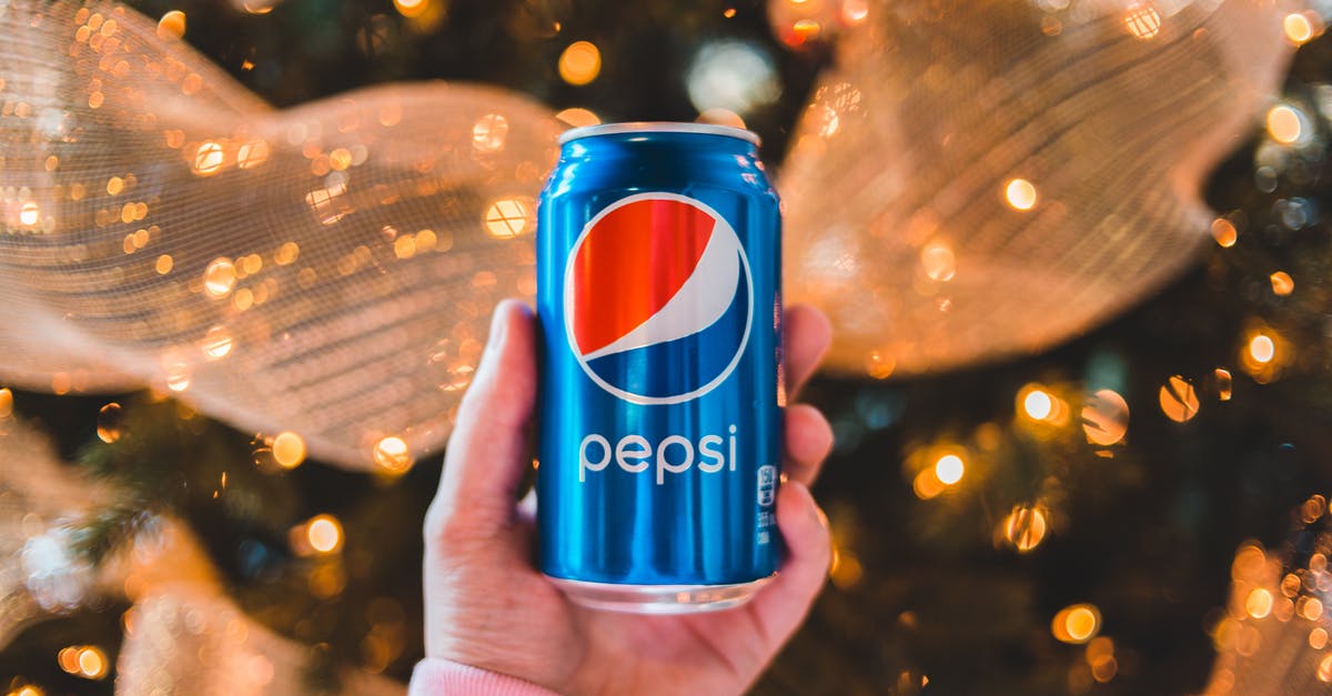 Can I decrease salty flavor after brining a turkey? - Crop unrecognizable person showing colorful can of refreshing drink during New Year holiday Can I decrease salty flavor after brining a turkey? - Crop unrecognizable person showing colorful can of refreshing drink during New Year holiday