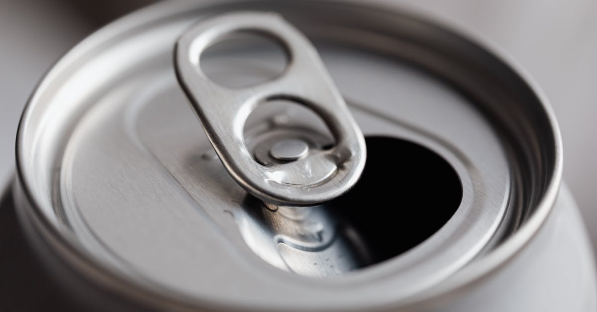 Can I dissolve mint in water and drink it? - Open grey metal soda can