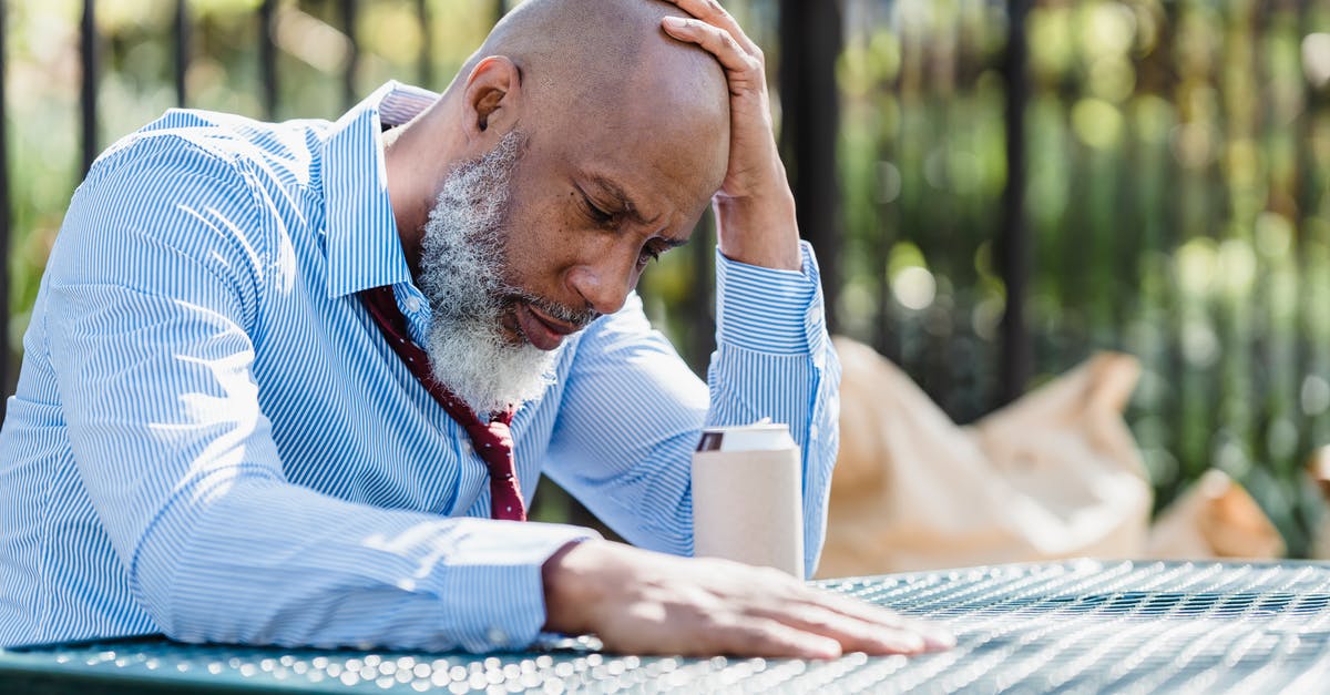 Can I increase the cocoa content in fudge? - Thoughtful black man sitting at table in veranda Can I increase the cocoa content in fudge? - Thoughtful black man sitting at table in veranda