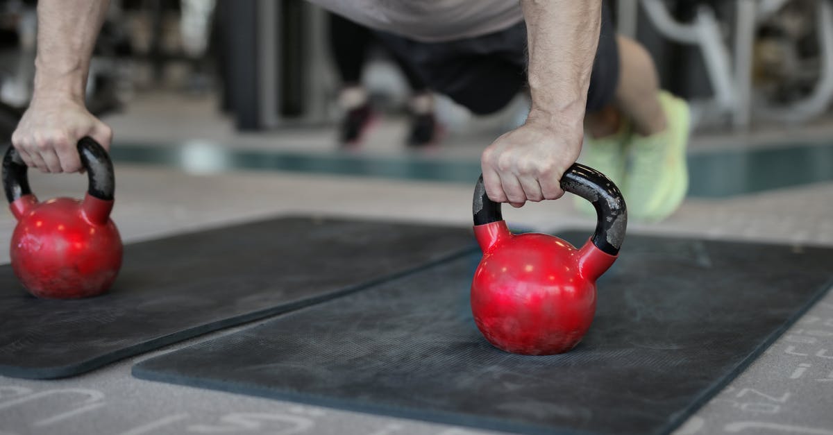 Can I let food be tested for spoilage after freezer power outage? - Muscular sportsman doing plank exercise on kettlebells Can I let food be tested for spoilage after freezer power outage? - Muscular sportsman doing plank exercise on kettlebells