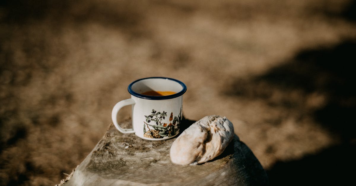 can i put hot soup in mason jar for travel - White Ceramic Mug on Brown Wooden Table can i put hot soup in mason jar for travel - White Ceramic Mug on Brown Wooden Table