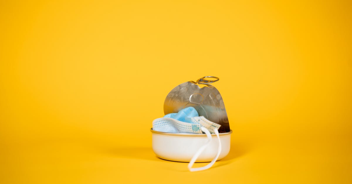 Can I repair a cake tin which has started to leak? - Crumpled Face Mask inside a Tin Can Can I repair a cake tin which has started to leak? - Crumpled Face Mask inside a Tin Can