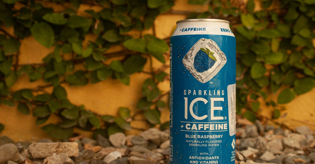 Can I rescue honey that is crystallised in the container? (with water or otherwise) [duplicate] - Sparkling Ice Drink on Brown Wooden Table