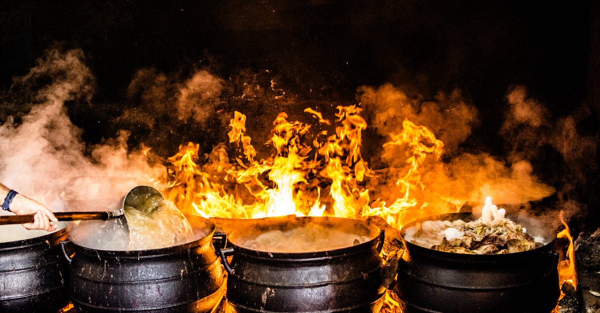Can I stack pots while cooking? - Time Lapse Photography of Four Black Metal Cooking Wares Can I stack pots while cooking? - Time Lapse Photography of Four Black Metal Cooking Wares