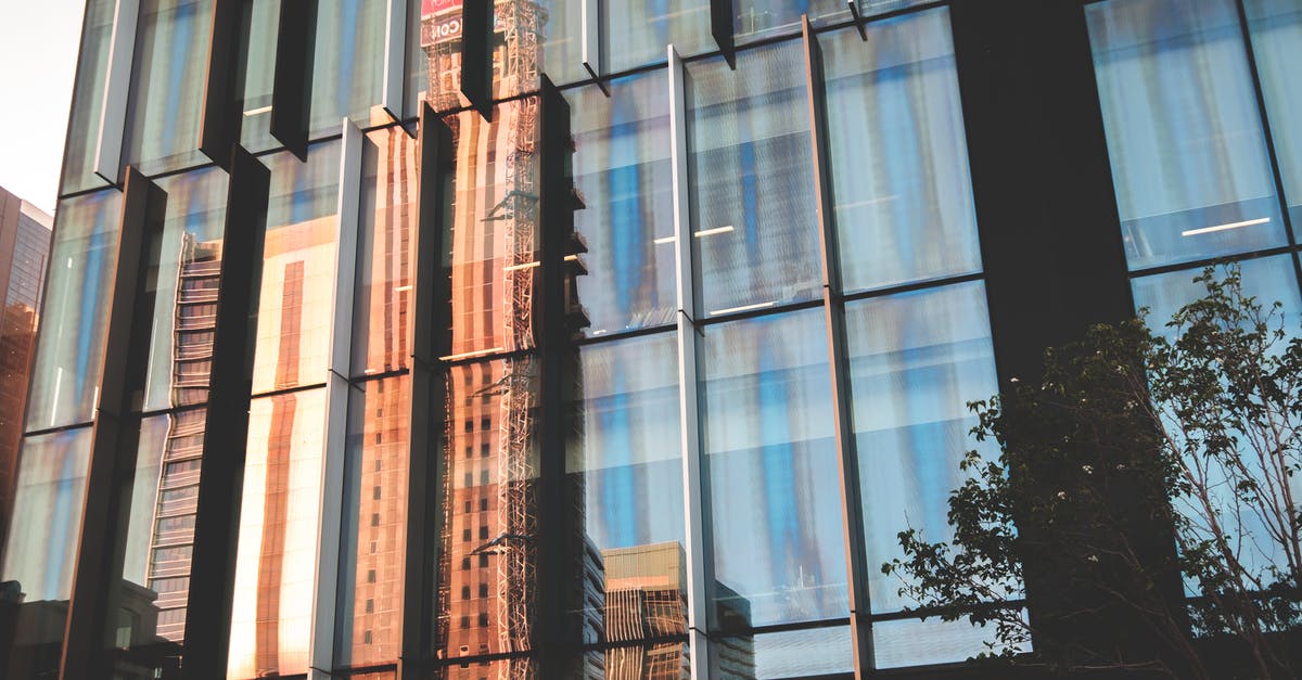 Can I still save my solid block of jam? - Modern facade of building reflecting street of city Can I still save my solid block of jam? - Modern facade of building reflecting street of city