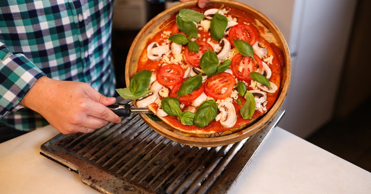 Can I un-seal canned tomato sauce, and re-seal after further cooking? - Person Holding Brown Ceramic Bowl With Vegetable Salad Can I un-seal canned tomato sauce, and re-seal after further cooking? - Person Holding Brown Ceramic Bowl With Vegetable Salad