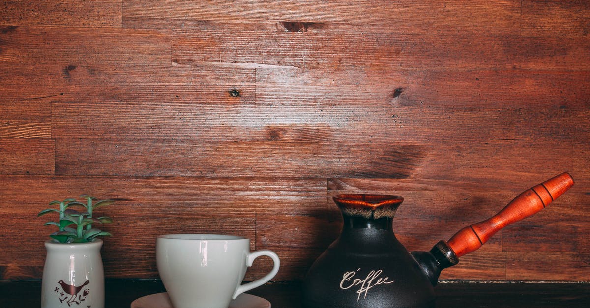 Can I use chestnut roaster clay pot to roast coffee at home? - Black and Orange Turkish Coffee Pot on Table Near Cup and Saucer Can I use chestnut roaster clay pot to roast coffee at home? - Black and Orange Turkish Coffee Pot on Table Near Cup and Saucer
