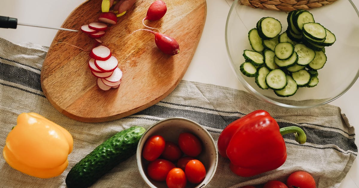 Can I use garlic leaf for cooking? - Sliced Tomato and Cucumber on Brown Wooden Chopping Board Can I use garlic leaf for cooking? - Sliced Tomato and Cucumber on Brown Wooden Chopping Board