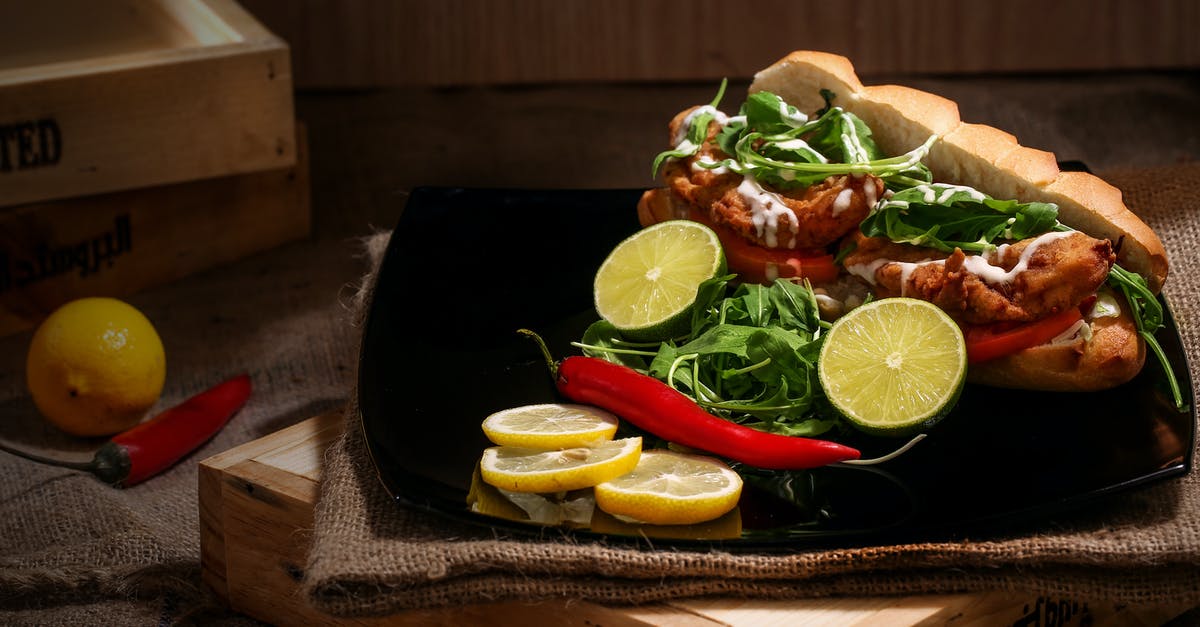 Can I use the same board for meat and vegetables? - Tray of Cooked Food