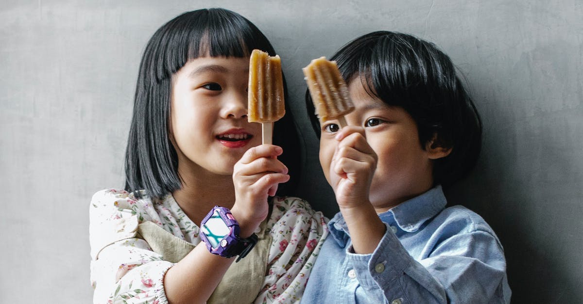 Can Ice Cream Maker Wall be Too Cold? - Little Asian kids showing ice creams Can Ice Cream Maker Wall be Too Cold? - Little Asian kids showing ice creams