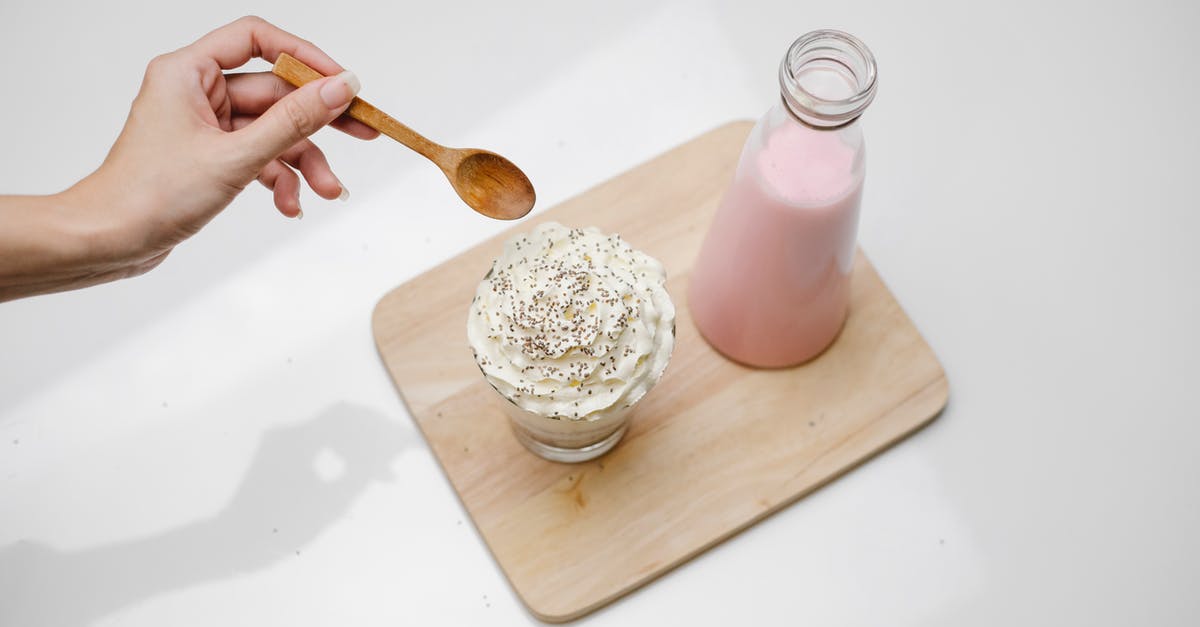 Can instant pudding be made without milk? - Woman checking dessert with whipped cream in studio Can instant pudding be made without milk? - Woman checking dessert with whipped cream in studio
