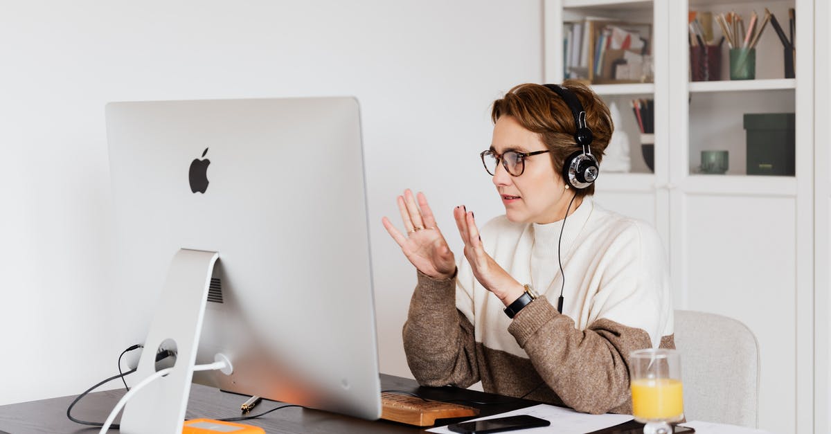 Can lemon juice concentrate be used after the use-by-date? - Content woman using computer during video call Can lemon juice concentrate be used after the use-by-date? - Content woman using computer during video call