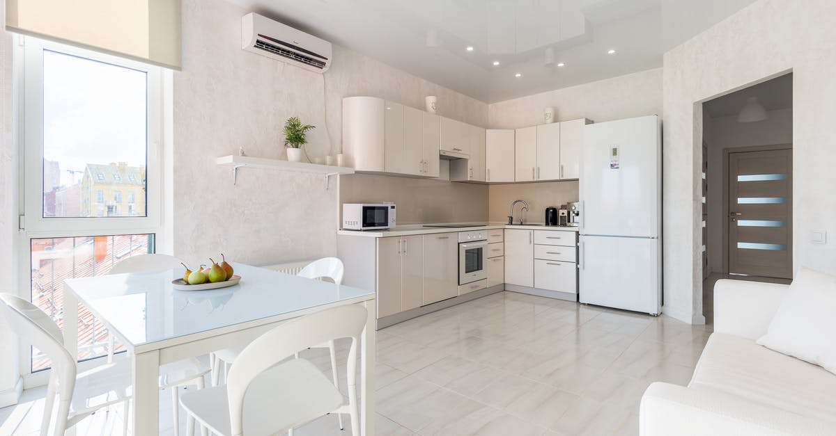 Can microwave safe glass vessels be used in an electric oven? - Interior of spacious light kitchen with dining zone Can microwave safe glass vessels be used in an electric oven? - Interior of spacious light kitchen with dining zone