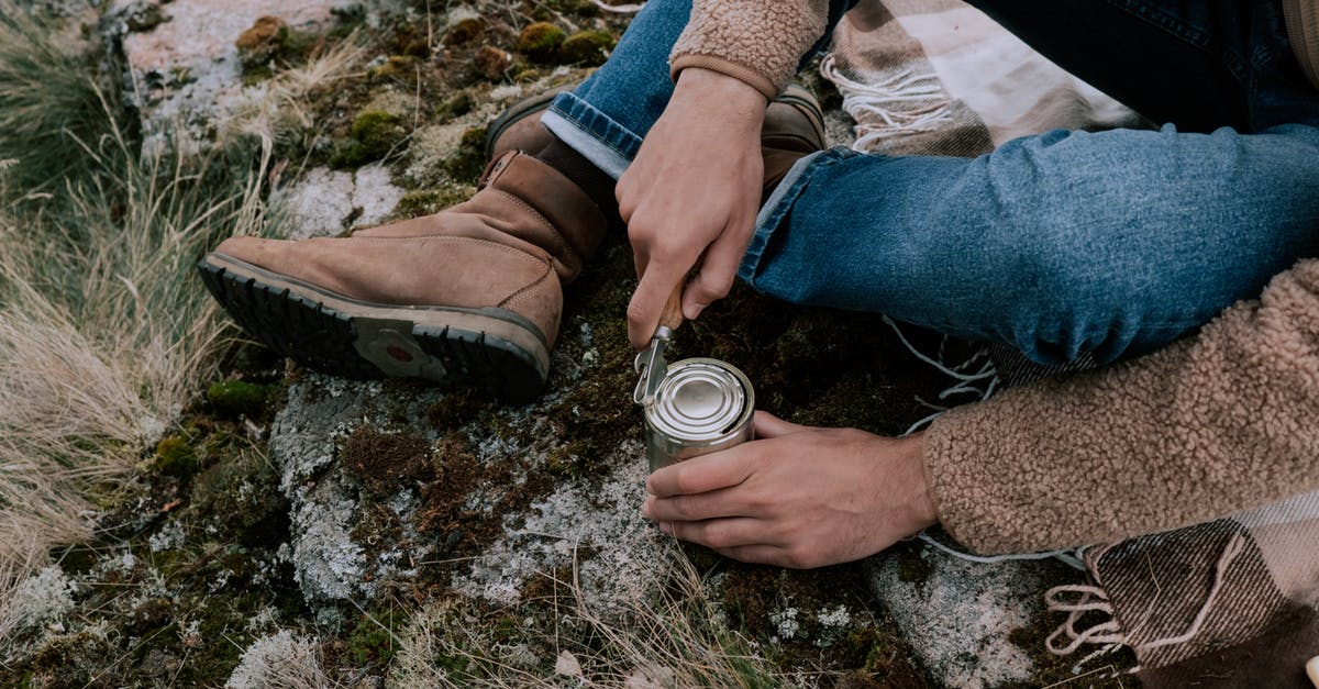 Can one preserve food by periodically heating it? - Person in Blue Denim Jeans and Brown Boots Holding Can Can one preserve food by periodically heating it? - Person in Blue Denim Jeans and Brown Boots Holding Can