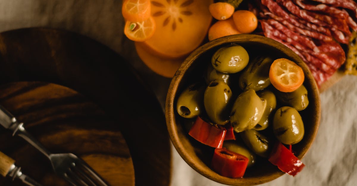 Can pickled pepper oil be used as cooking oil? - Sliced Fruits on Brown Wooden Bowl Can pickled pepper oil be used as cooking oil? - Sliced Fruits on Brown Wooden Bowl