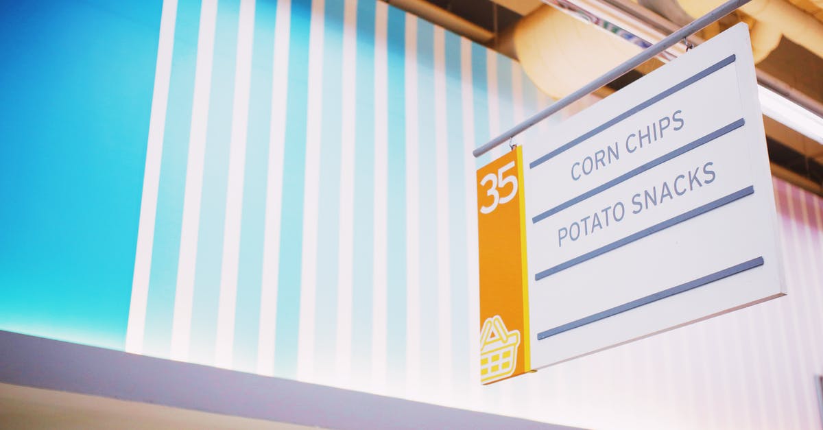 Can "cream-style" corn substitute for creamed corn in cornbread? - From below of signboard with inscription Corn chips Potato snacks hanging under ceiling in contemporary supermarket