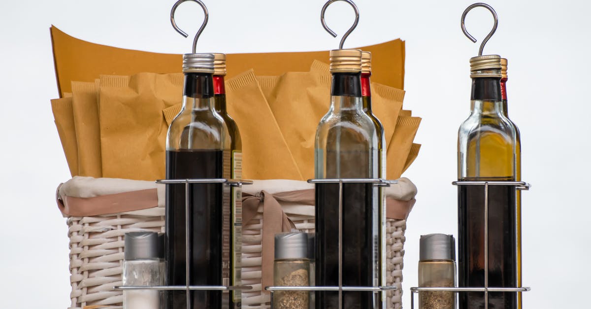 Can red wine vinegar replace white wine vinegar? - Clear Glass Bottles on Stainless Steel Rack Can red wine vinegar replace white wine vinegar? - Clear Glass Bottles on Stainless Steel Rack