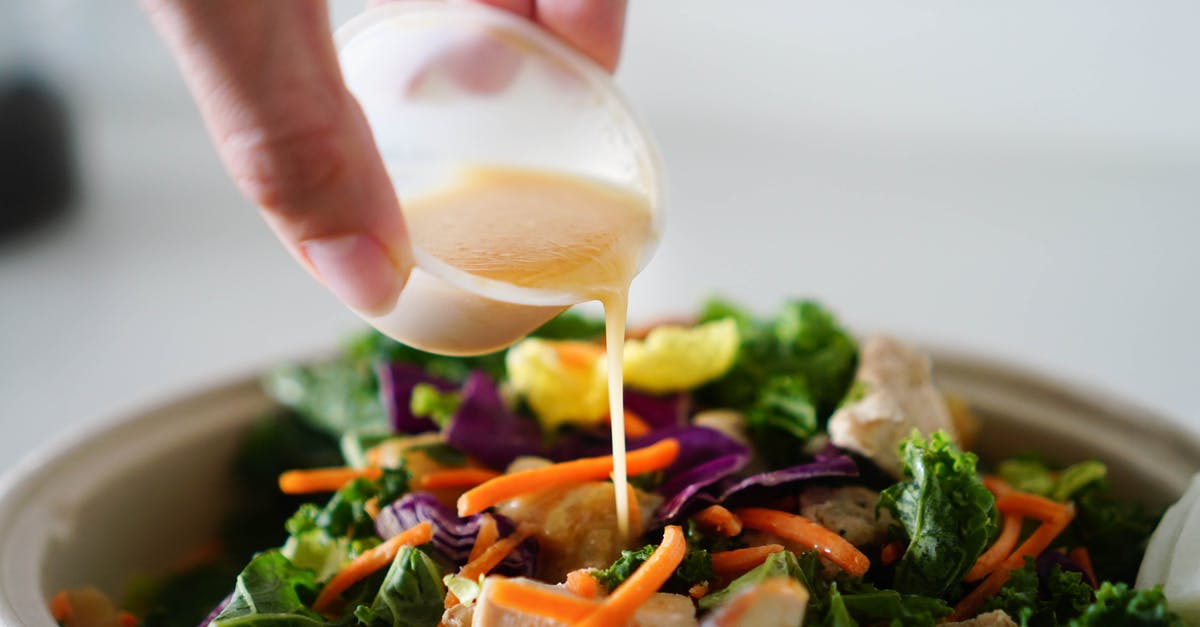 Can salad dressing be made with coconut oil? - Close-Up Photo of a Person Pouring Salad Dressing into Vegetables Can salad dressing be made with coconut oil? - Close-Up Photo of a Person Pouring Salad Dressing into Vegetables