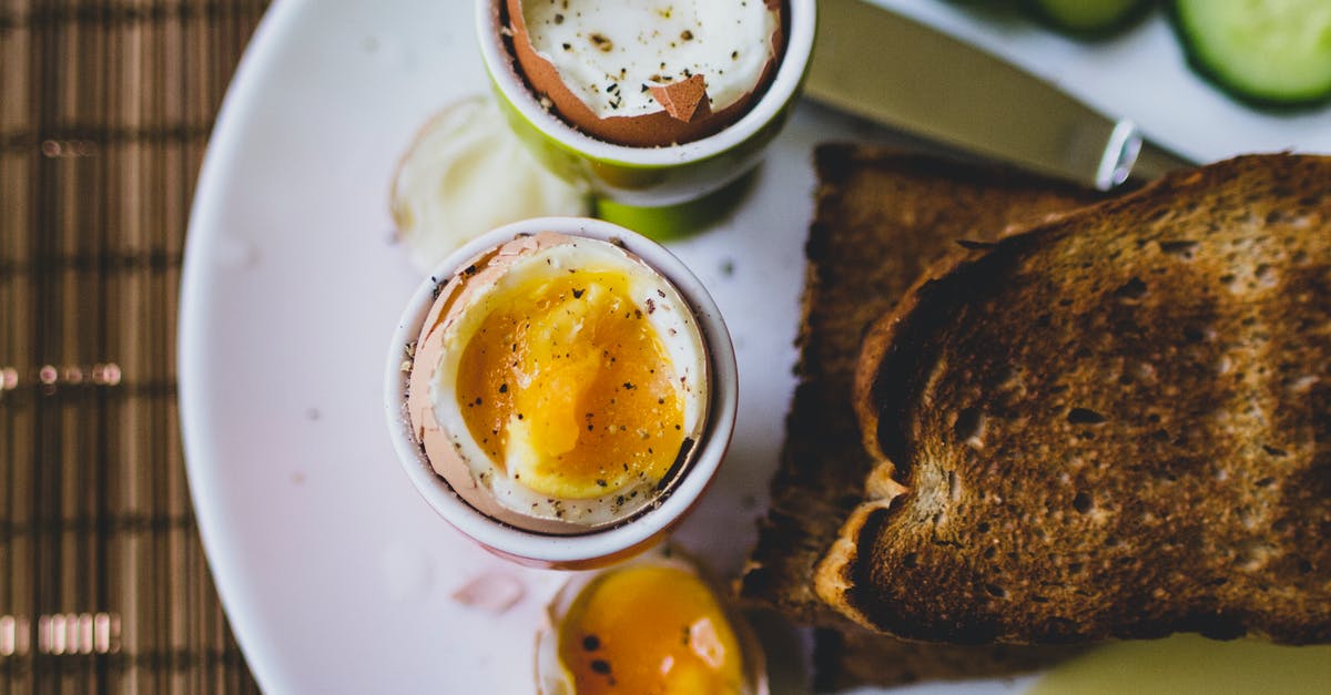 Can soft-boiled eggs be reboiled and turned into hard-boiled eggs? - Foods on Plate Topped With egg cups with boiled eggs Can soft-boiled eggs be reboiled and turned into hard-boiled eggs? - Foods on Plate Topped With egg cups with boiled eggs