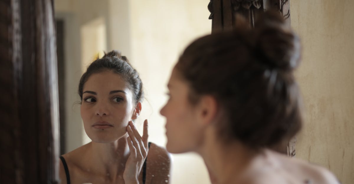 Can the skin of lychee be used for anything? - Reflection Photo of Woman Touching Her Cheek Can the skin of lychee be used for anything? - Reflection Photo of Woman Touching Her Cheek