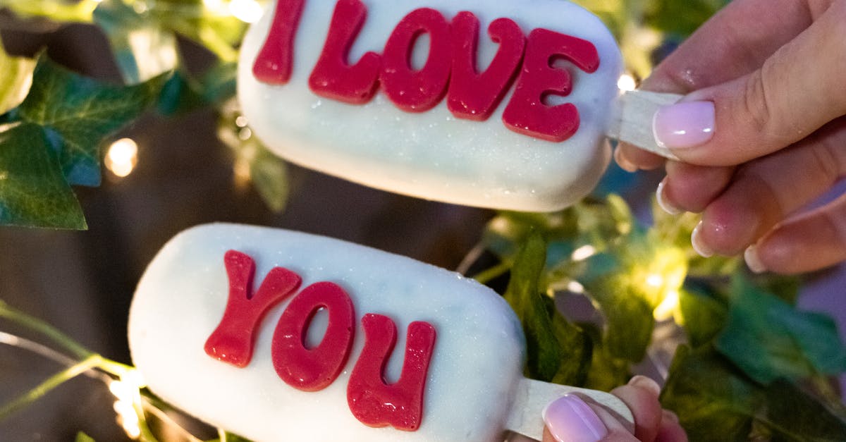 Can you brine frozen meat? - Person Holding Popsicles With Text Can you brine frozen meat? - Person Holding Popsicles With Text
