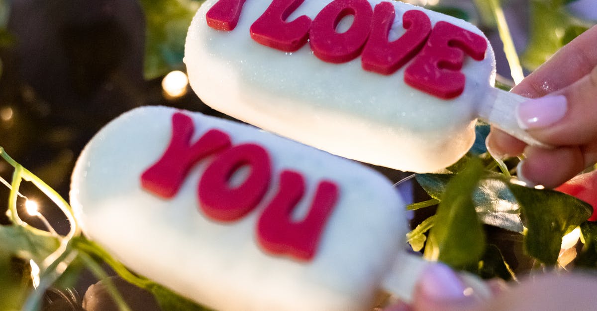 Can you brine frozen meat? - Person Holding Ice Pops With Text Can you brine frozen meat? - Person Holding Ice Pops With Text
