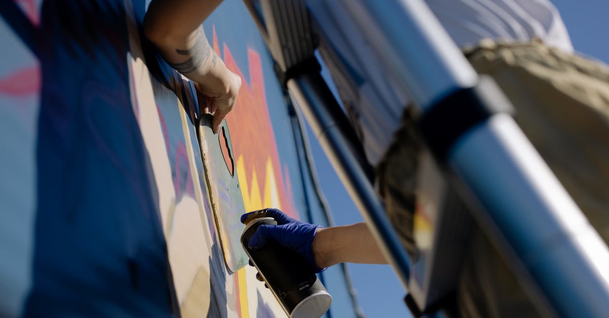 Can you create brown butter directly from heavy cream? - From below of crop unrecognizable person in casual clothes and gloves using spray can while painting graffiti wall standing on ladder Can you create brown butter directly from heavy cream? - From below of crop unrecognizable person in casual clothes and gloves using spray can while painting graffiti wall standing on ladder