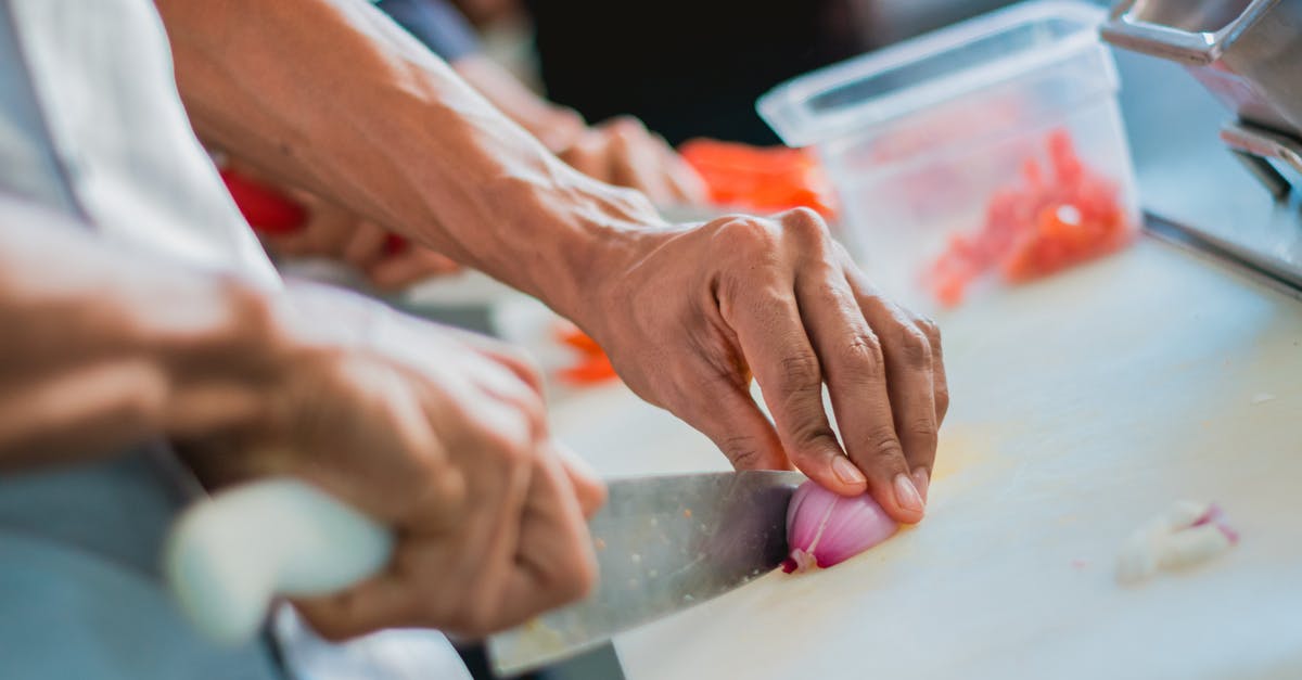 Can you develop an immunity to chopping onions causing tears? - Person Chopping Onion with Kitchen Knife Can you develop an immunity to chopping onions causing tears? - Person Chopping Onion with Kitchen Knife